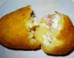 Arancino di riso (prosciutto-mozzarella)